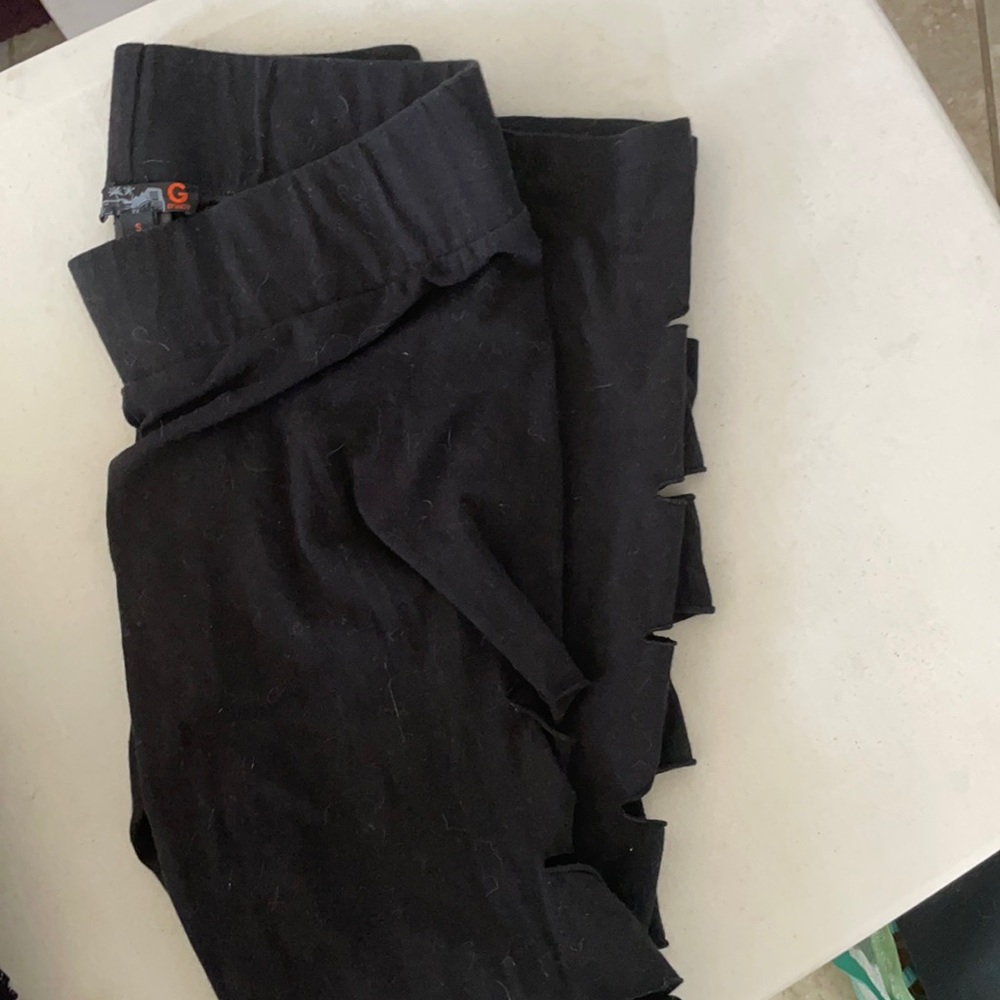 Black guess leggings size small w/ holes all the way down the side of the legs